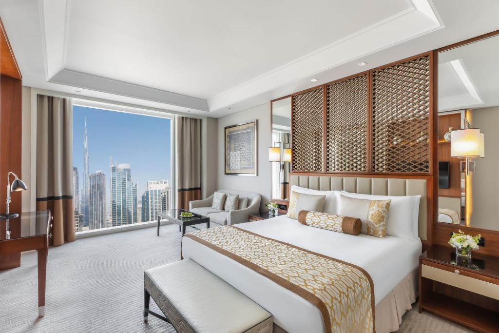 A luxurious room with a stunning view of Dubai skyline at one of the best hotels in Dubai for business travelers.