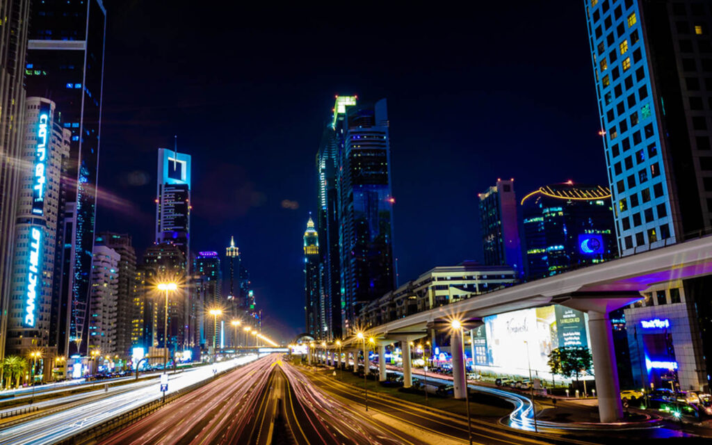 A vibrant image of the bustling downtown Dubai nightlife scene