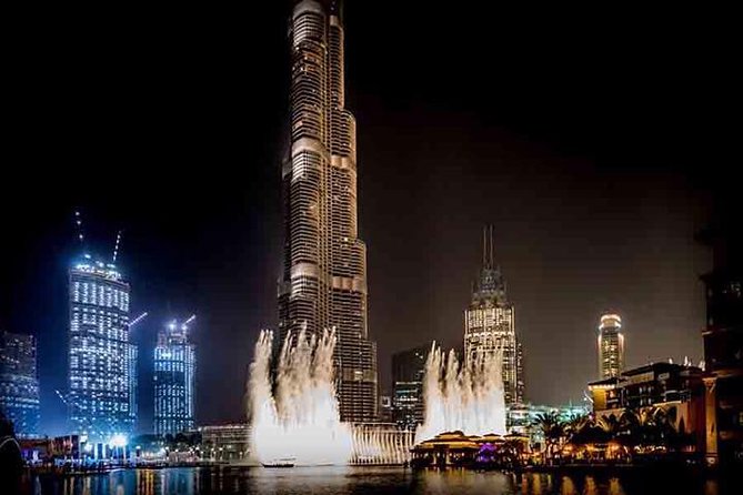 Aerial view of Dubai Fountain with Burj Khalifa in the background