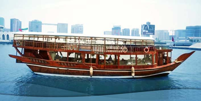 Deira with traditional wooden boat and many malls