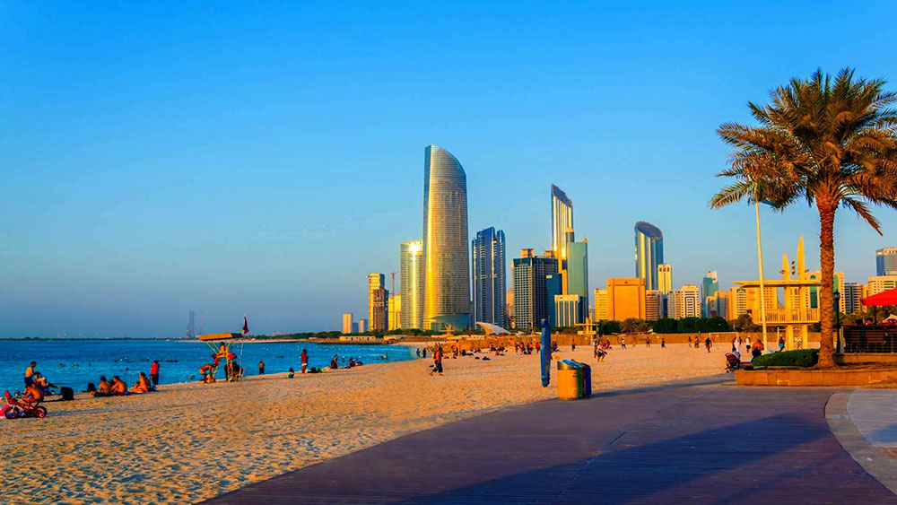 People enjoying a beach in Abu Dhabi