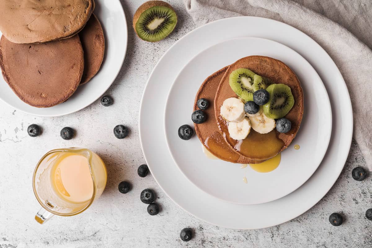 A delicious plate of vegan pancakes, one of the best breakfast in Dubai options for vegans and vegetarians.