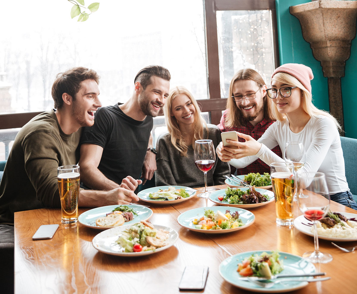 A group of friends enjoying a pan-asian cuisine brunch in Dubai